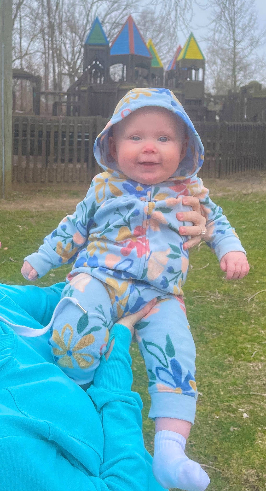 Dahlia joined the competition — help win amazing prizes! baby, baby_toddler_clothing, child, electric_blue, fun, grass, happy, head, headwear, leisure, person, personal_protective_equipment, pink, plant, play, recreation, sitting, sky, sleeve, smile
