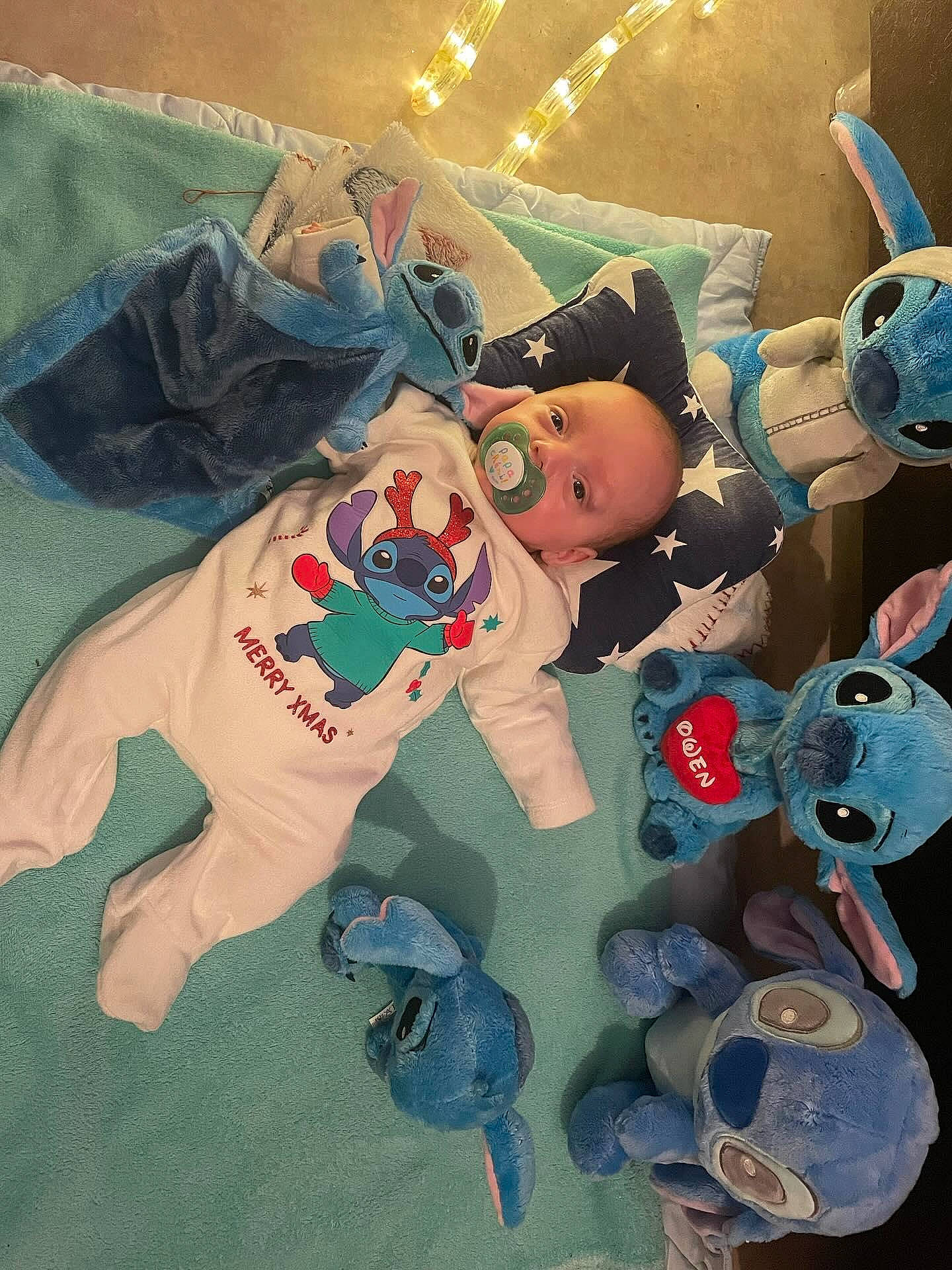 Owen participe au concours pour gagner de l'argent avec cette photo : art, baby_products, baby_toddler_clothing, baby_toys, carmine, child, electric_blue, fiction, fictional_character, linens, person, plastic, plush, sleeve, space, stuffed_toy, textile, toy, visual_arts, world