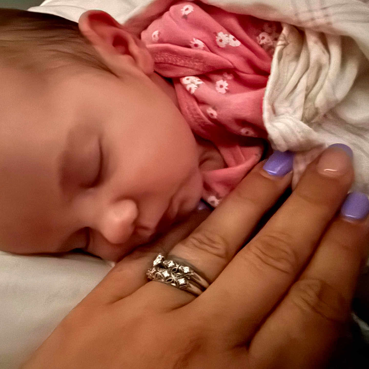 Mirabella is registered to the contest to win money with this photo: baby, sleeping, blanket, hand, ring, nail_polish, pink_clothing, closeup, peaceful, infant, skin, portrait, rest, soft, tender, newborn, human, comfort, cozy, cute