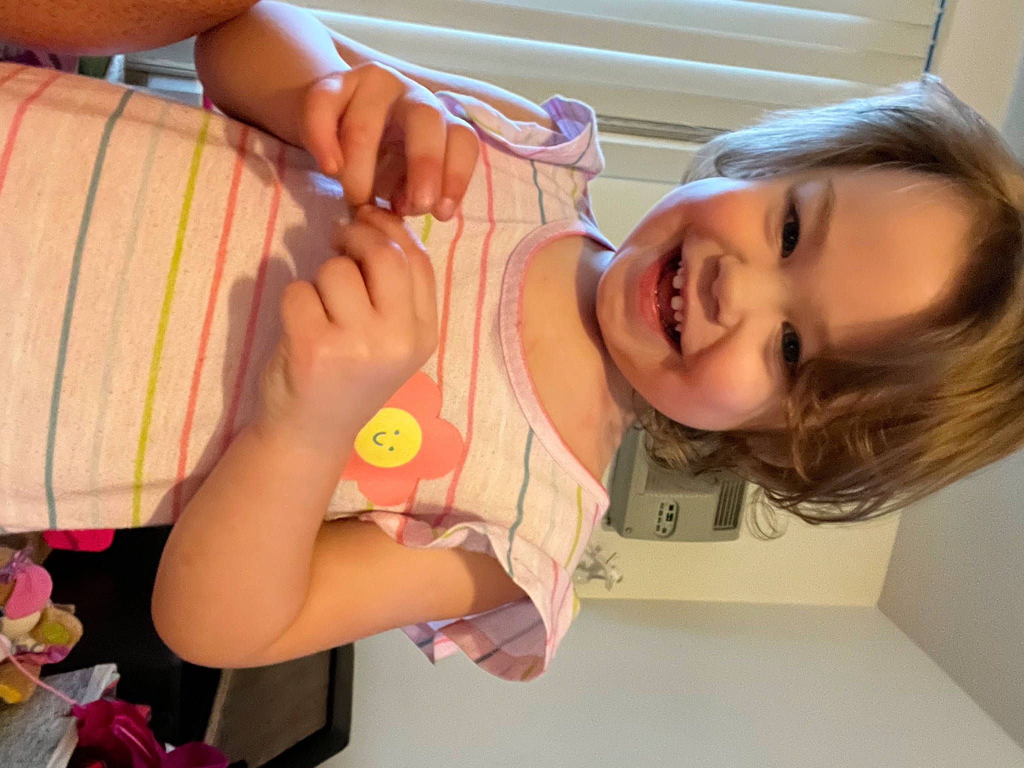 Rayne is registered to the contest to win money with this photo: arm, chest, child, eyelash, face, finger, fun, gesture, hand, happy, joy, lip, mouth, nail, nose, person, skin, smile, thigh, thumb