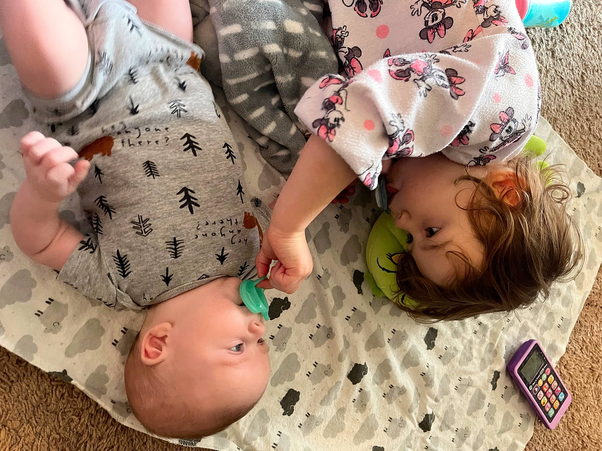 Rayne is registered to the contest to win money with this photo: abdomen, arm, baby, baby_toddler_clothing, cheek, chest, child, finger, gesture, grass, hand, happy, pattern, person, product, skin, sleeve, stomach, thigh, toddler