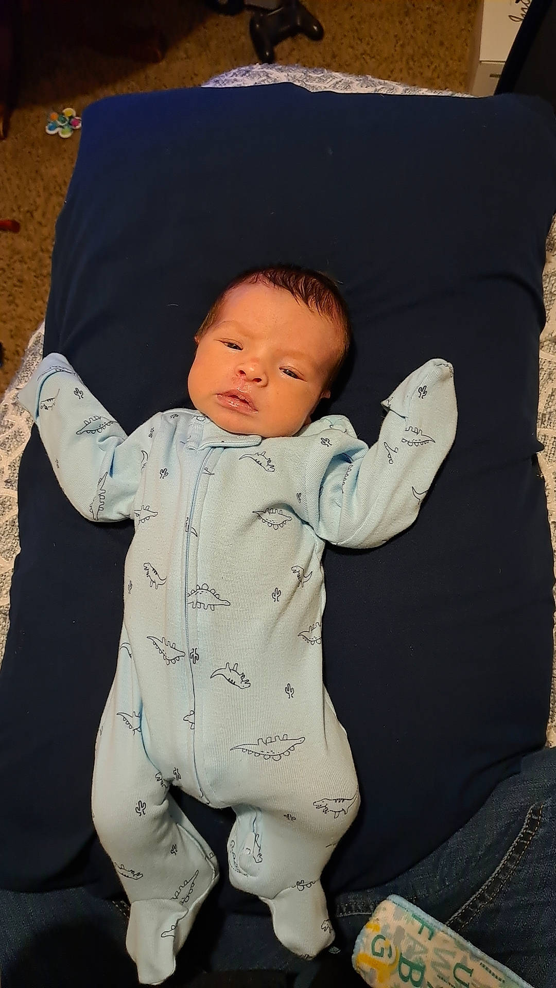 Raziel is registered to the contest to win money with this photo: abdomen, baby, baby_products, baby_sleeping, baby_toddler_clothing, brown, cheek, child, comfort, face, fun, fur, gesture, head, lap, linens, person, sitting, skin, sleeve