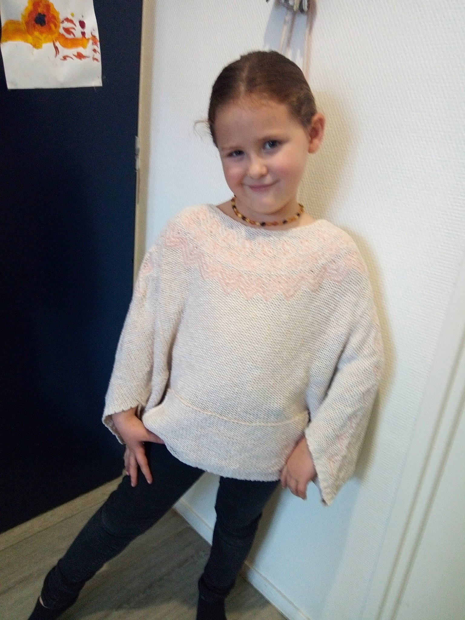 Elza participe au concours pour gagner de l'argent avec cette photo : art, beige, clothing, dress, fashion, footwear, fur, joint, joy, knitting, lip, neck, outerwear, person, poncho, shoulder, sleeve, sweater, tights, top