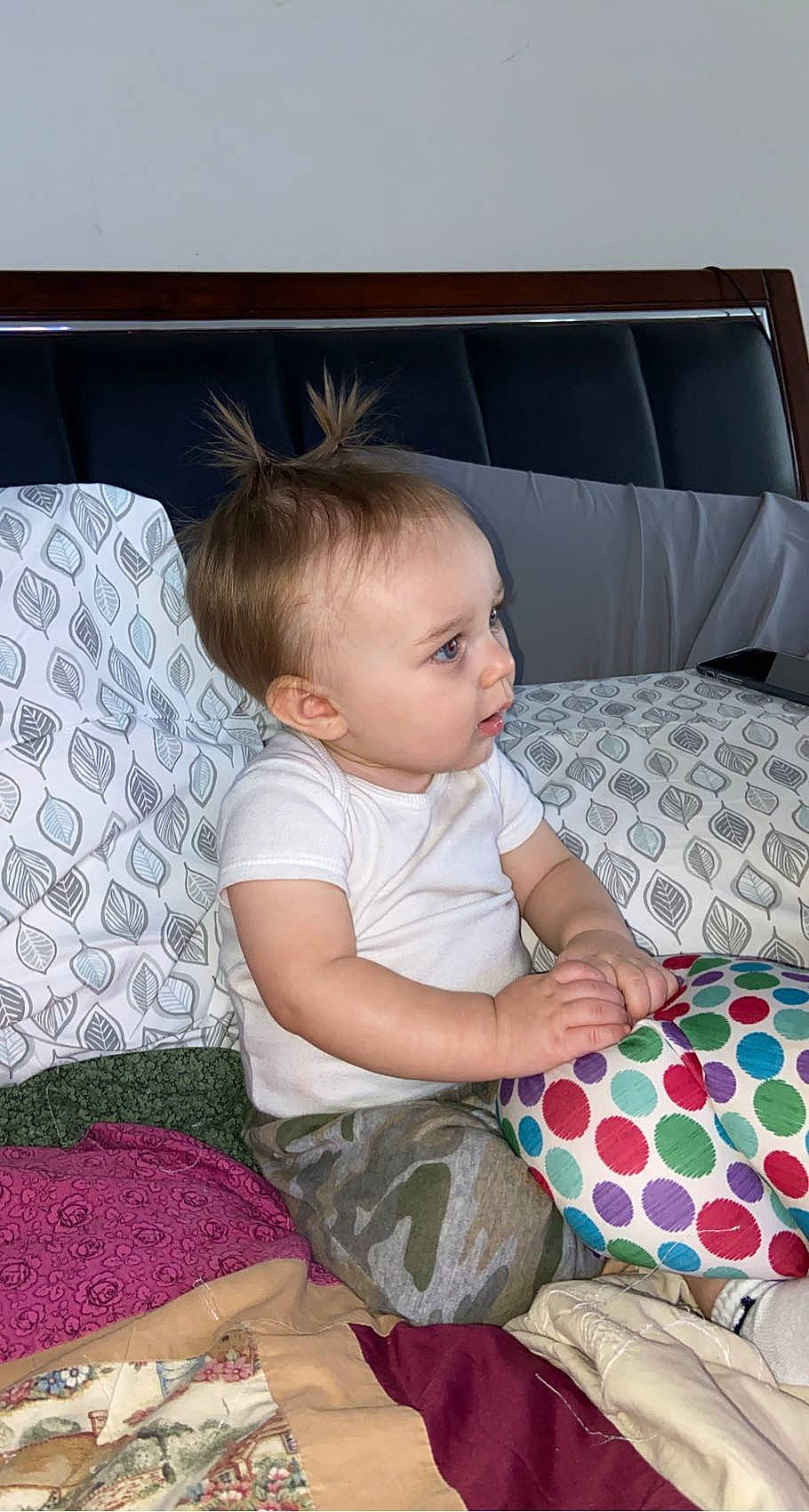 Atlas joined the competition — help win amazing prizes! baby, baby_toddler_clothing, beauty, child, comfort, couch, flooring, hairstyle, lap, linens, living_room, mammal, pattern, person, product, room, sitting, skin, sleeve, textile