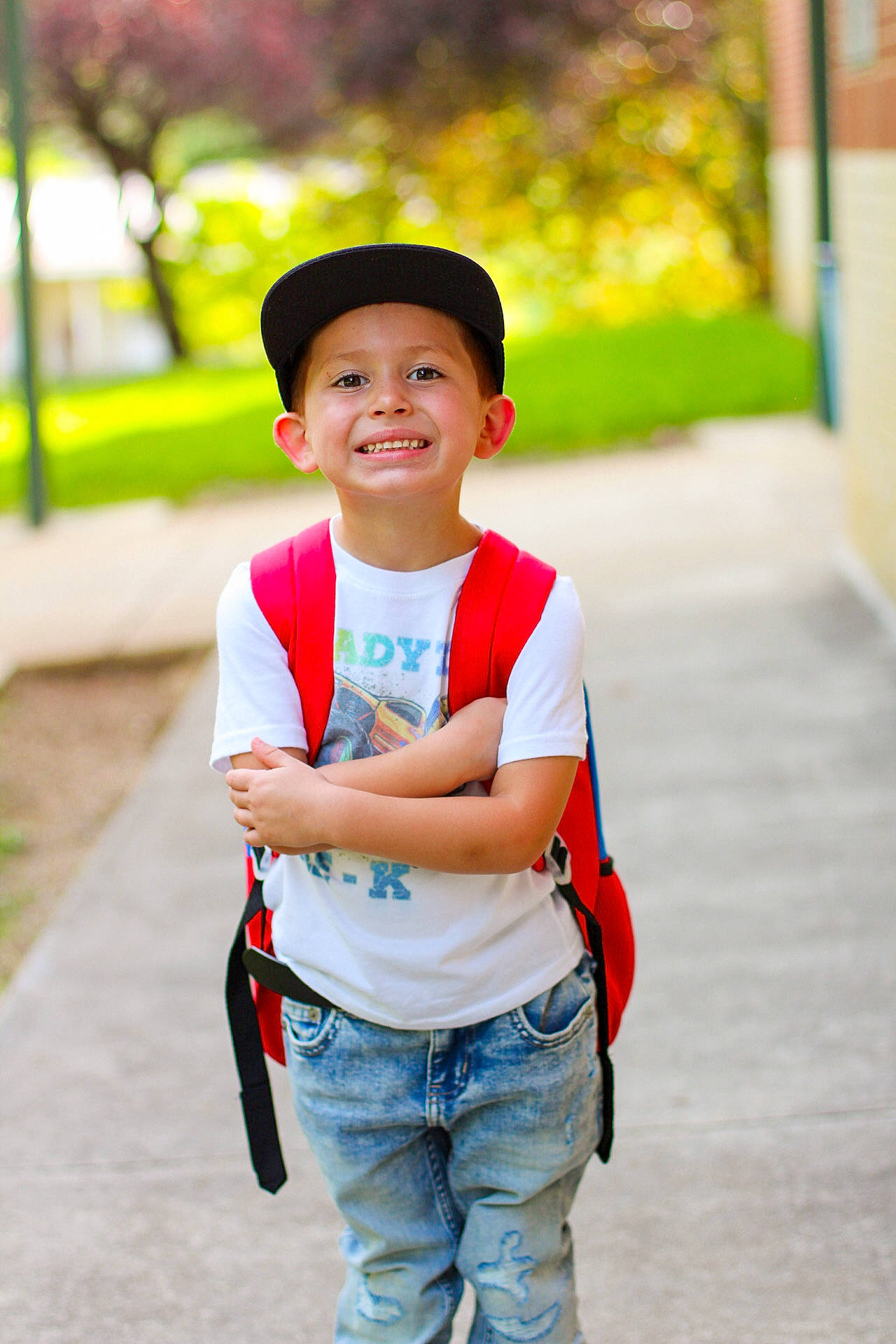 Daxton is registered to the contest to win money with this photo: cap, child, denim, electric_blue, fun, happy, headwear, jeans, joy, leisure, person, portrait_photography, recreation, sleeve, smile, t_shirt, toddler, travel, tree, vacation