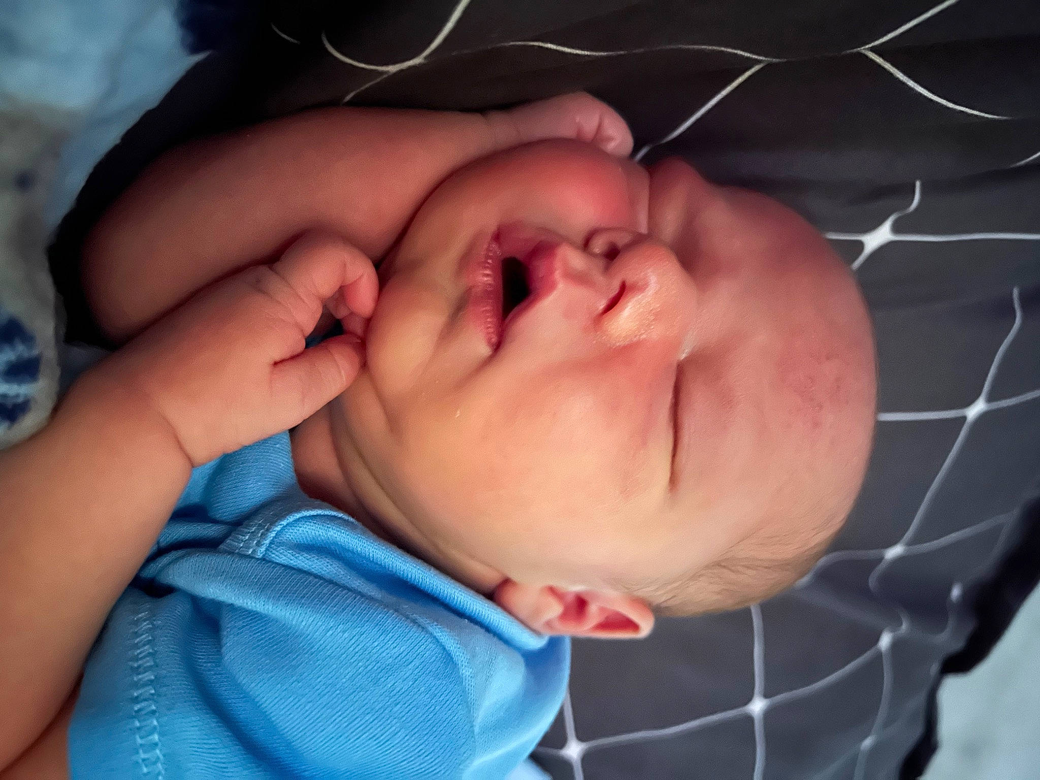 Liam is registered to the contest to win money with this photo: baby, baby_toddler_clothing, cheek, child, close_up, comfort, eyelash, finger, gesture, happy, human_body, iris, lip, mouth, nose, person, skin, sleeve, smile, thumb