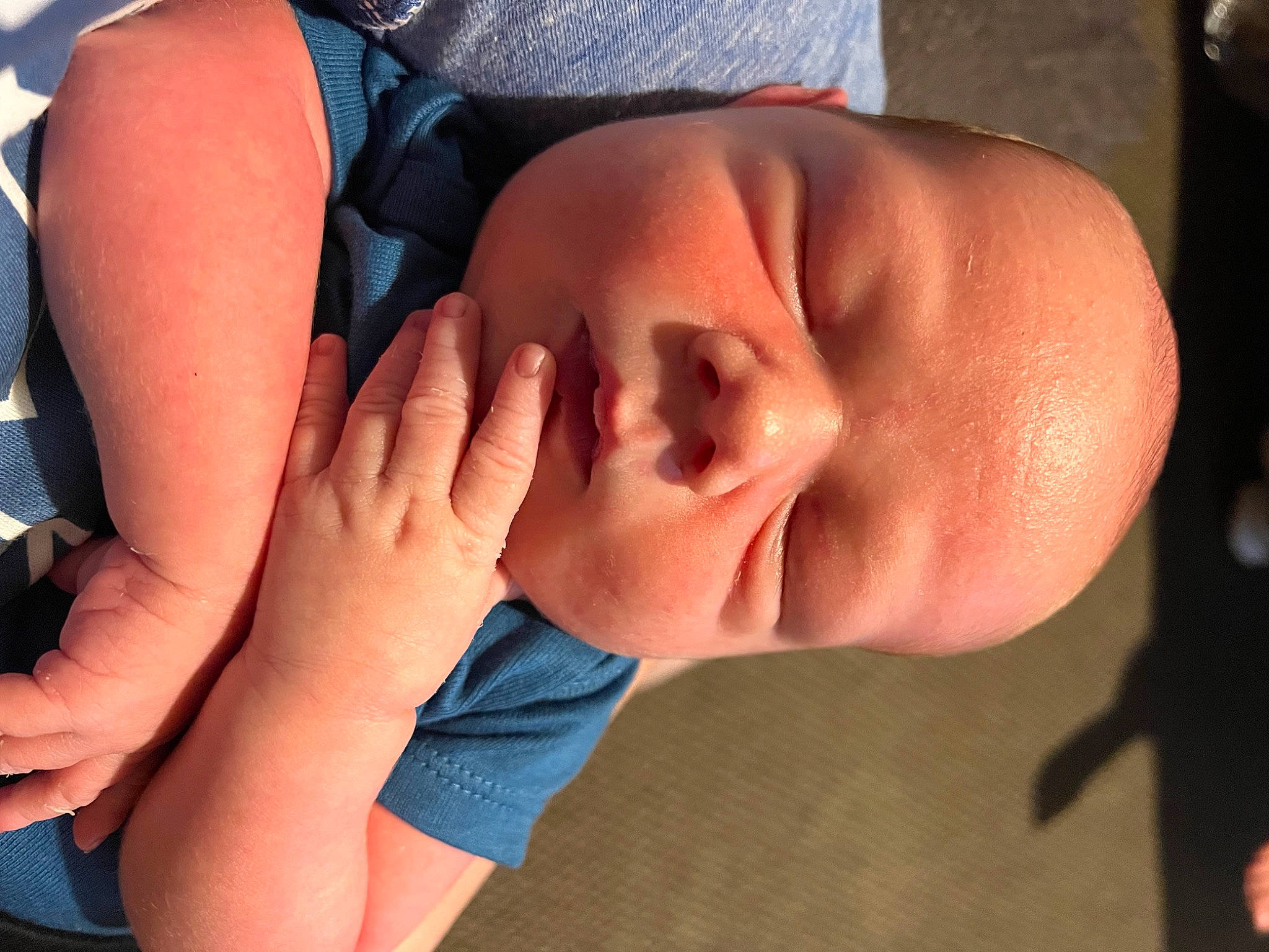 Liam is registered to the contest to win money with this photo: arm, baby, cheek, comfort, eyelash, finger, gesture, hand, happy, head, human_body, joint, leg, lip, mouth, muscle, neck, nose, person, shoulder