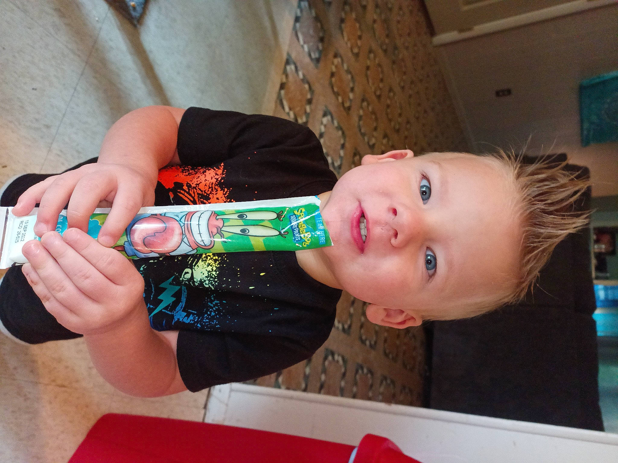 Remington joined the competition — help win amazing prizes! carmine, child, drink, drinking, drinkware, elbow, finger, food, fun, gesture, happy, human_leg, nail, person, smile, thumb, toddler, wrist