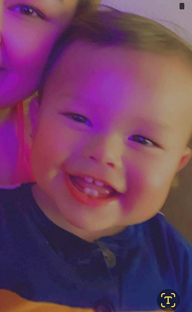 Andrew is registered to the contest to win money with this photo: cheek, chin, ear, eye, eyebrow, eyelash, face, forehead, happy, human_body, iris, jaw, joy, lip, mouth, nose, person, purple, skin, smile