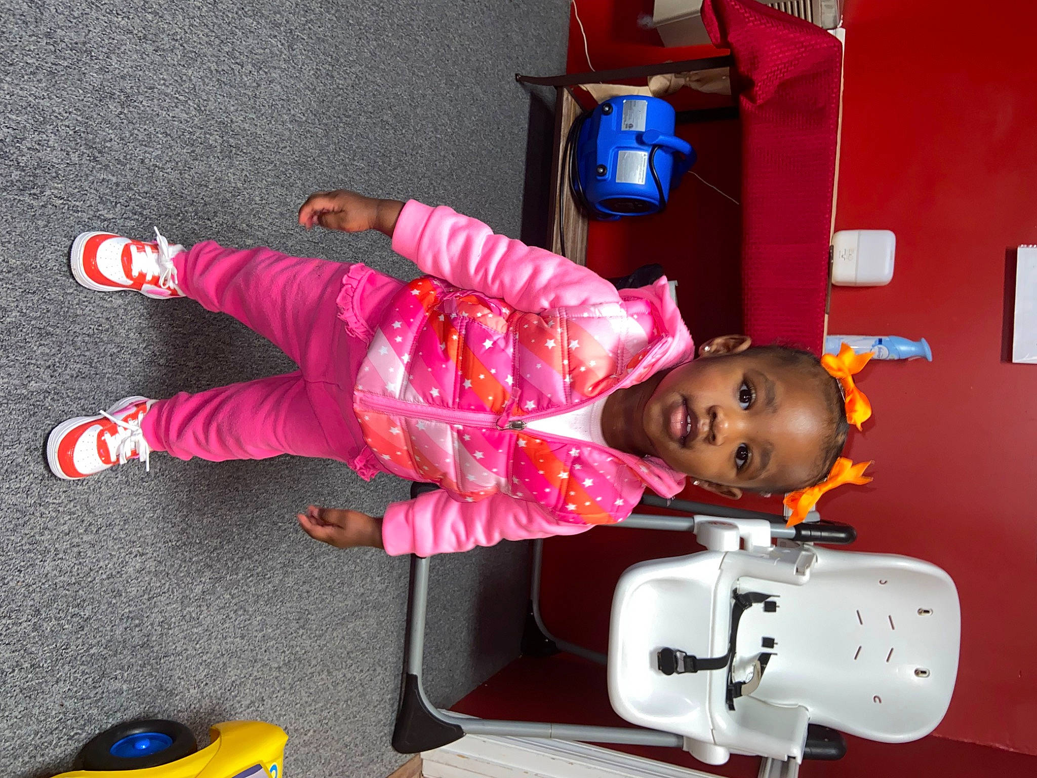 Kyrielle is registered to the contest to win money with this photo: baby, baby_products, baby_toddler_clothing, baby_toys, child, fun, happy, machine, magenta, person, pink, play, red, room, sitting, smile, snapshot, sock, toddler, yellow