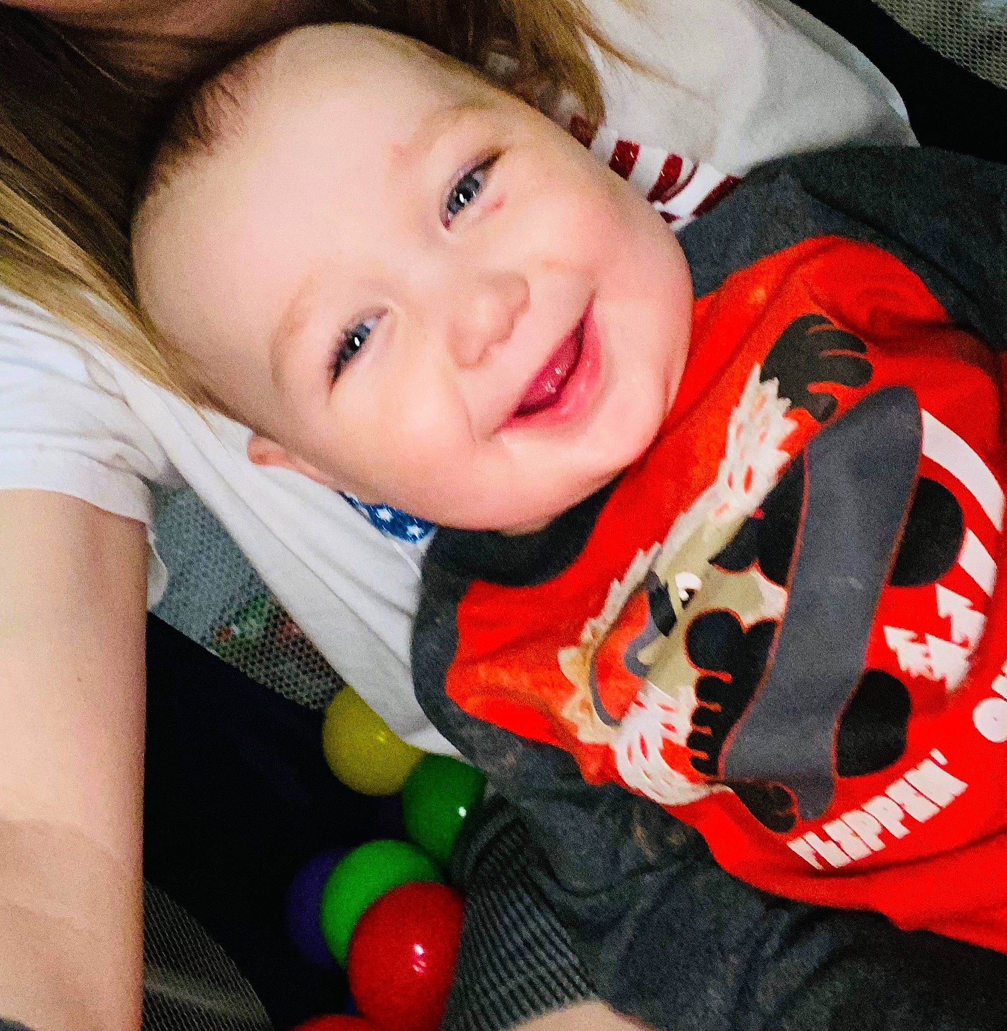 Waylon Sawyer is registered to the contest to win money with this photo: baby, baby_products, baby_toddler_clothing, carmine, cheek, child, comfort, facial_expression, finger, fun, happy, joy, nose, pattern, person, product, red, skin, sleeve, smile