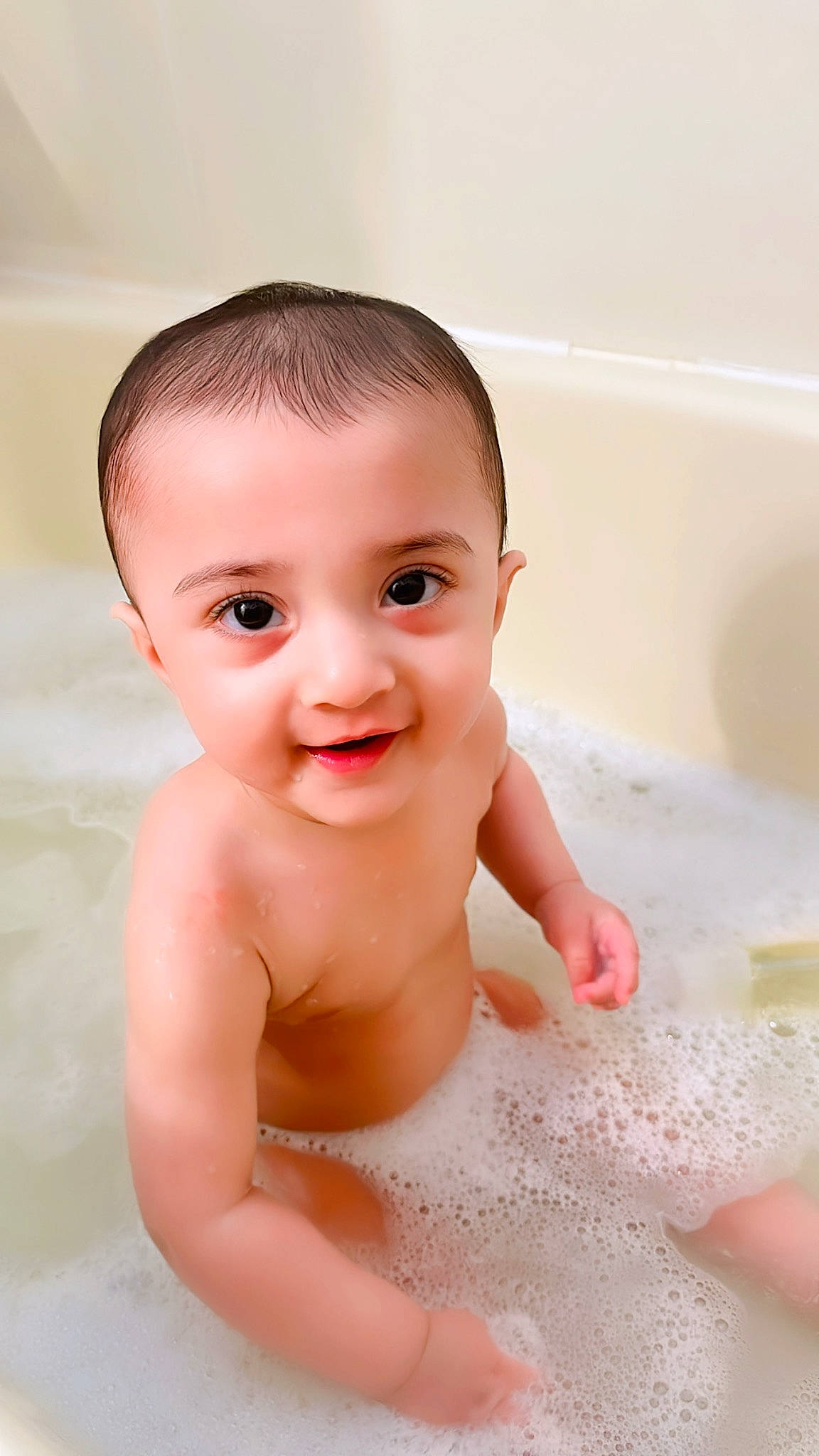 Jadyn joined the competition — help win amazing prizes! baby, baby_bathing, bathing, bathroom, bathtub, chest, child, eyelash, fluid, foam, fun, happy, human_body, liquid, person, plumbing, skin, smile, stomach, toddler