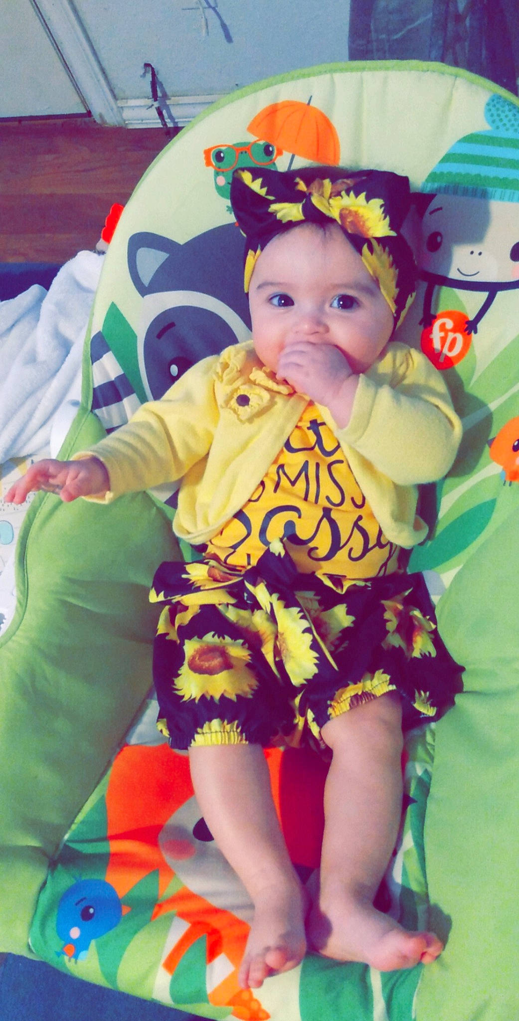 Mavis is registered to the contest to win money with this photo: baby, baby_toddler_clothing, cap, child, costume_hat, day_dress, event, fun, happy, hat, headband, headwear, human_body, magenta, person, pink, purple, smile, snapshot, textile