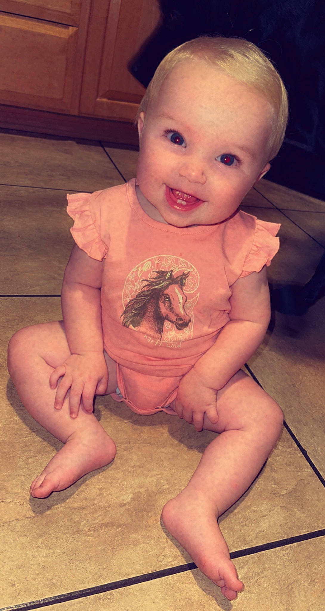 Aubriella is registered to the contest to win money with this photo: baby, baby_toddler_clothing, cheek, eye, fawn, finger, floor, flooring, happy, iris, leg, mouth, neck, nose, organ, person, pink, skin, smile, thigh