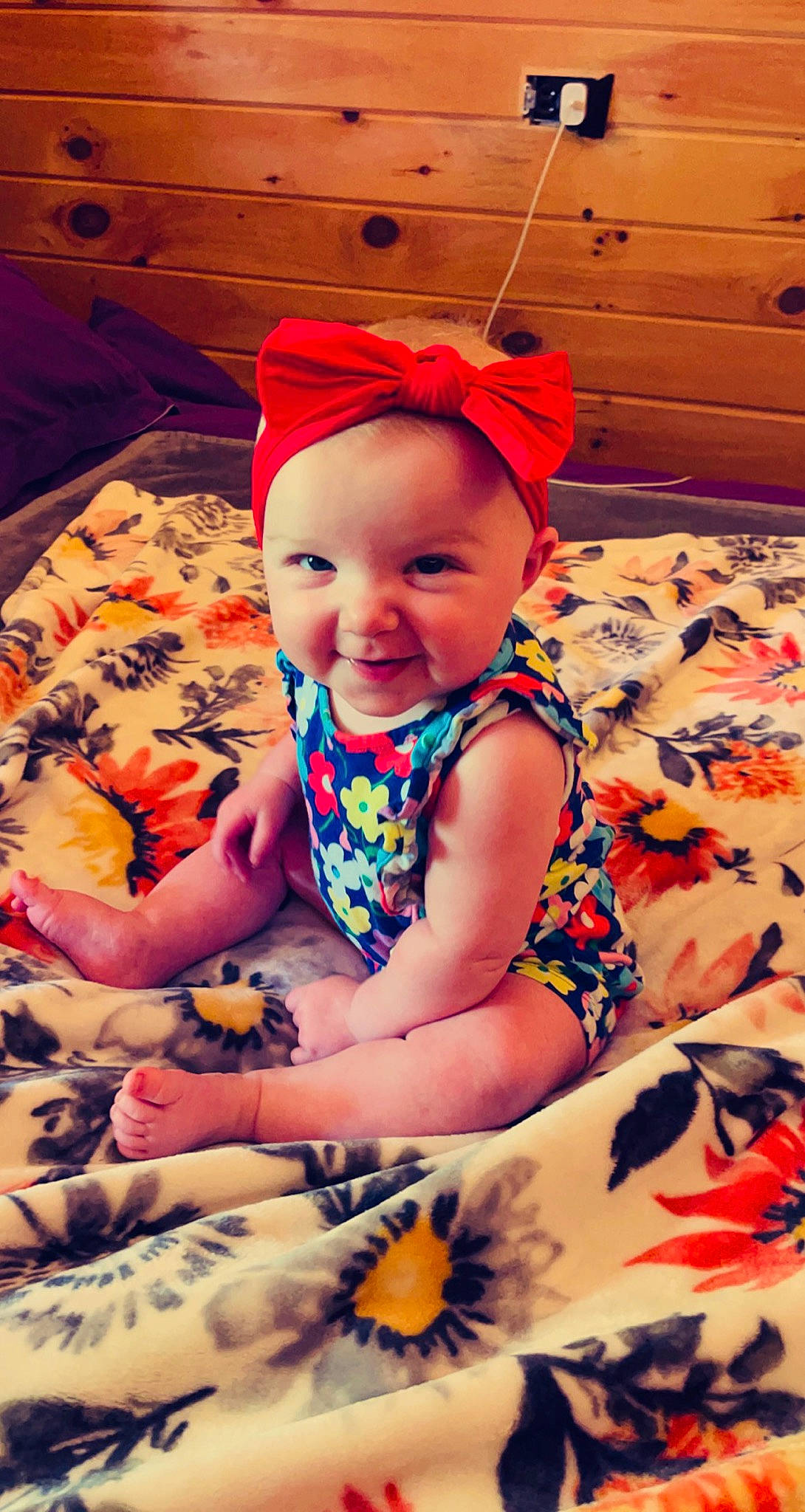 Aubriella is registered to the contest to win money with this photo: baby, baby_toddler_clothing, cap, child, cool, dress, eye, facial_expression, flooring, fun, happy, joy, mouth, orange, pattern, person, pink, skin, smile, t_shirt