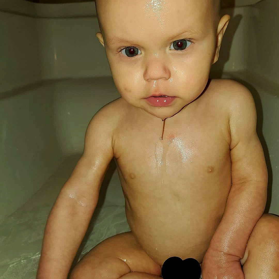 Clinton is registered to the contest to win money with this photo: baby, baby_bathing, baby_making_funny_faces, barechested, bathing, bathtub, cheek, chest, child, eye, face, forehead, head, muscle, neck, nose, person, skin, stomach, toddler