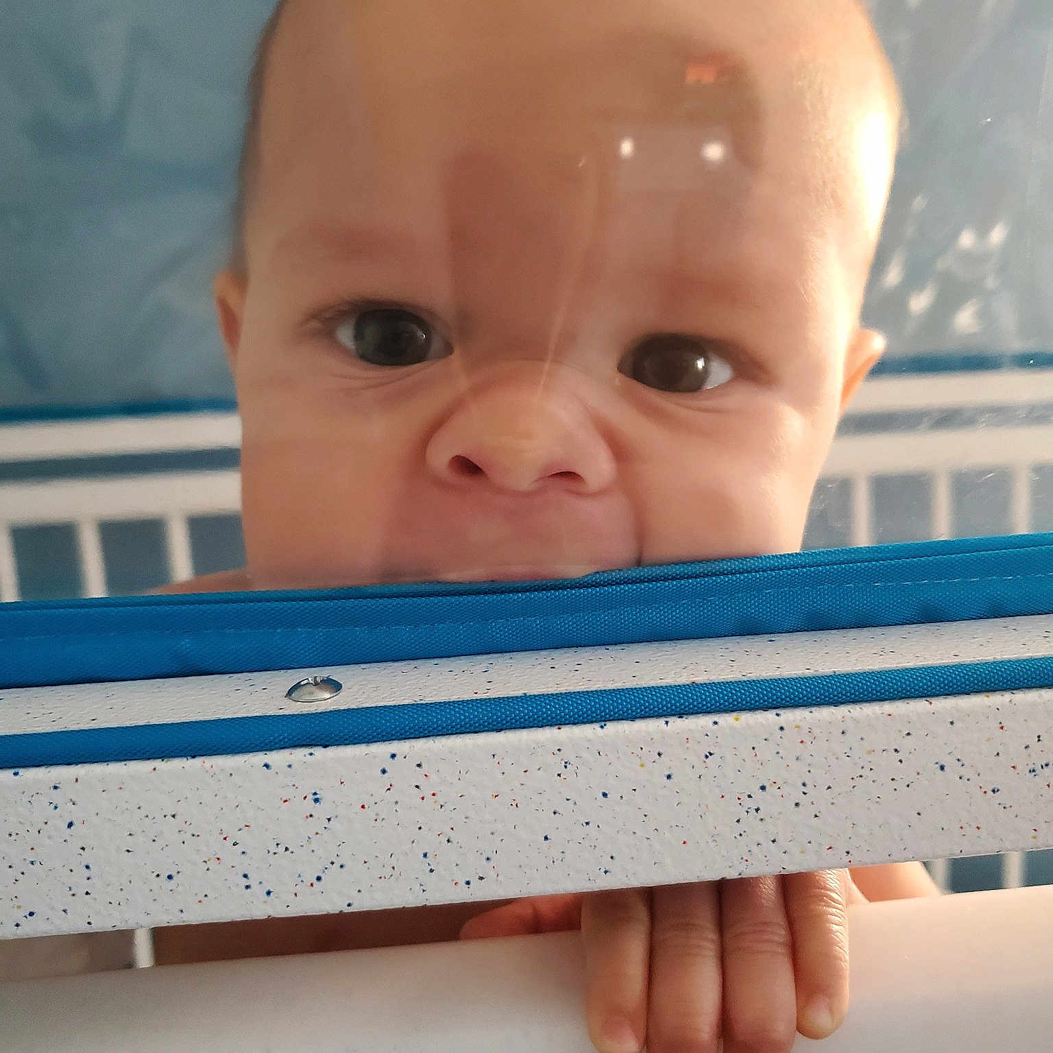 Clinton is registered to the contest to win money with this photo: baby, baby_safety, blue, cheek, child, eye, face, finger, forehead, hand, head, lip, mouth, nose, product, skin, smile, toddler