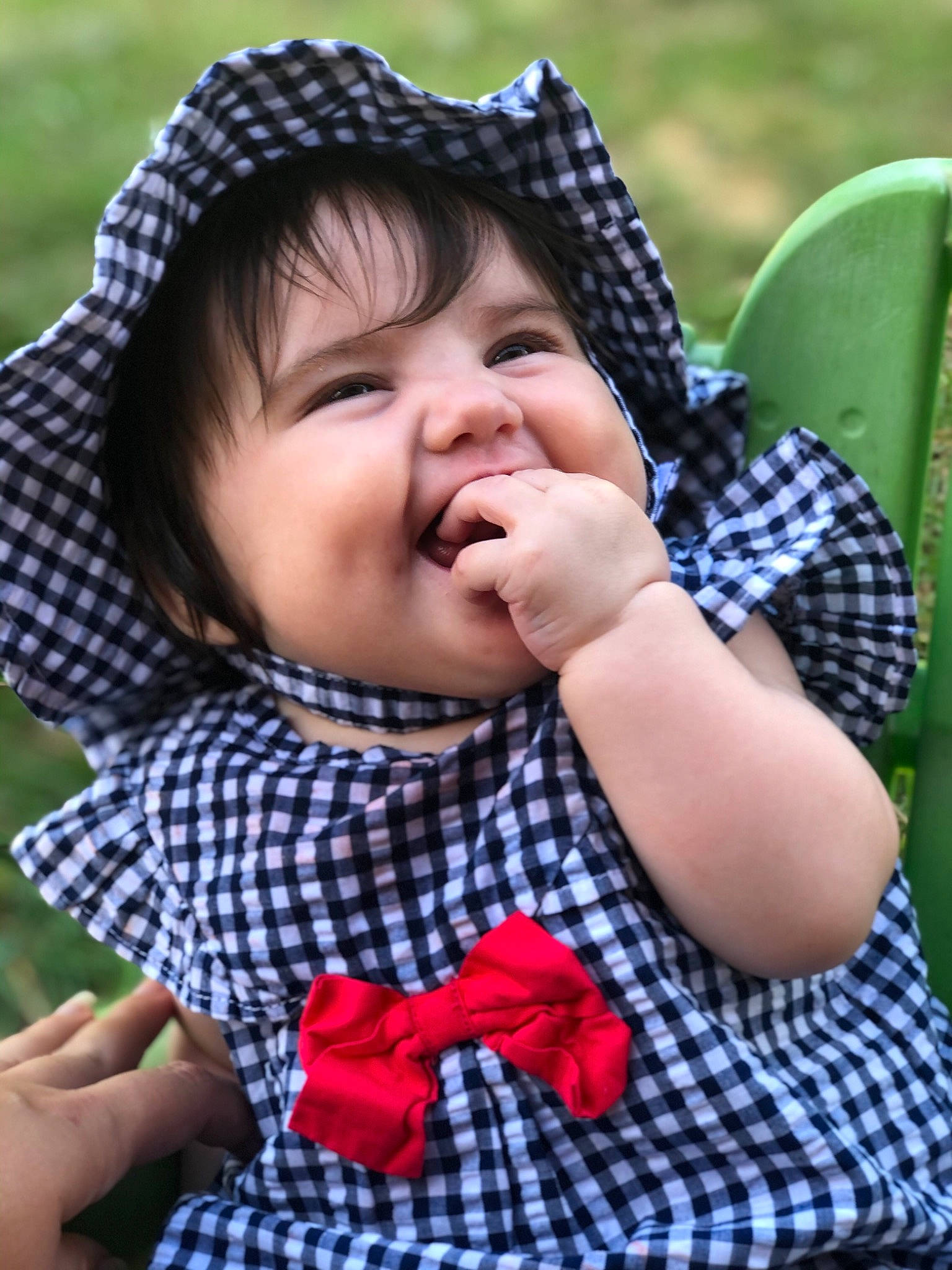 Annalise joined the competition — help win amazing prizes! baby, baby_toddler_clothing, cheek, chin, collar, finger, gesture, hand, happy, head, lip, neck, nose, people_in_nature, person, plaid, skin, sleeve, smile, tartan