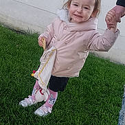 Khäcilya participe au concours pour gagner de l'argent avec cette photo : blanket, candid, casual, child, cute, daylight, footwear, grass, happy, holding_hand, outdoor, person, pink_jacket, playing, smiling, snack, toddler, toy, winter_clothing, young_child