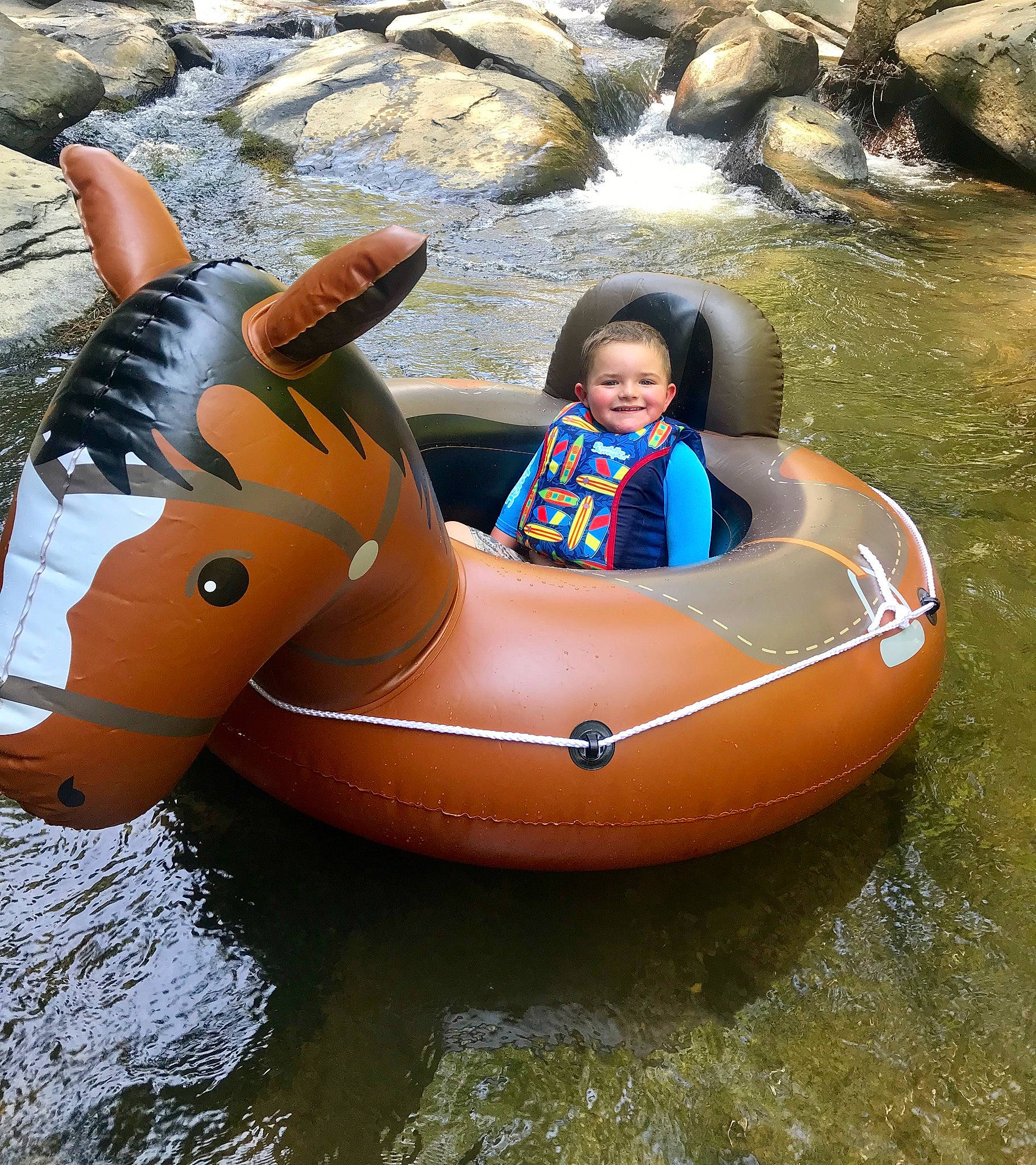 Lee joined the competition — help win amazing prizes! boat, boating, boats_and_boating_equipment_and_supplies, fun, games, inflatable, inflatable_boat, joy, leisure, lifejacket, person, personal_protective_equipment, recreation, river, tubing, vacation, vehicle, water_transportation