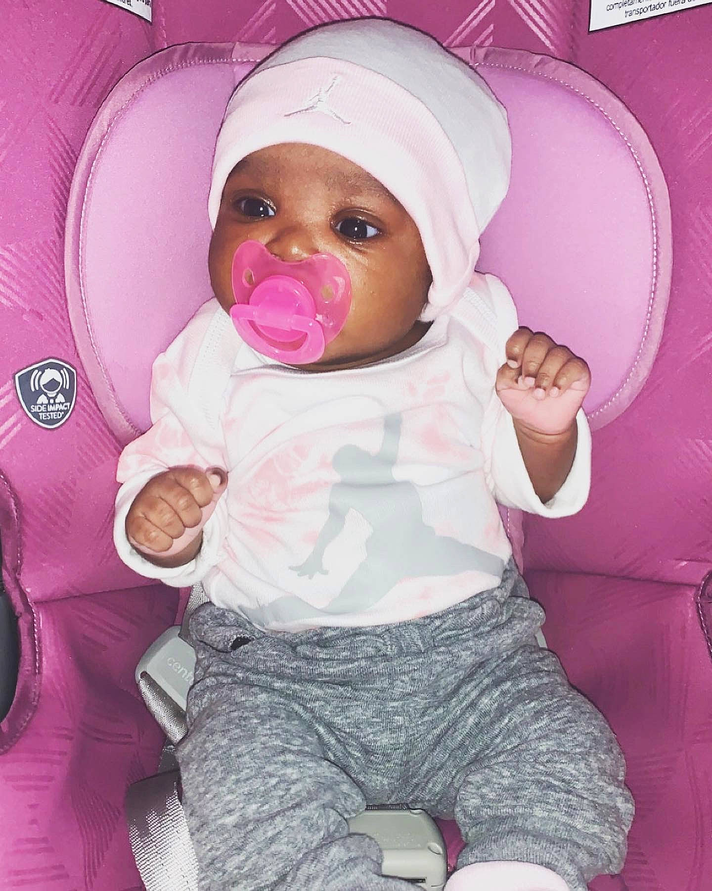 Dearra is registered to the contest to win money with this photo: baby, baby_sleeping, baby_toddler_clothing, cap, cheek, comfort, eyelash, finger, headwear, lip, magenta, mouth, nose, person, pink, product, purple, skin, sleeve, textile