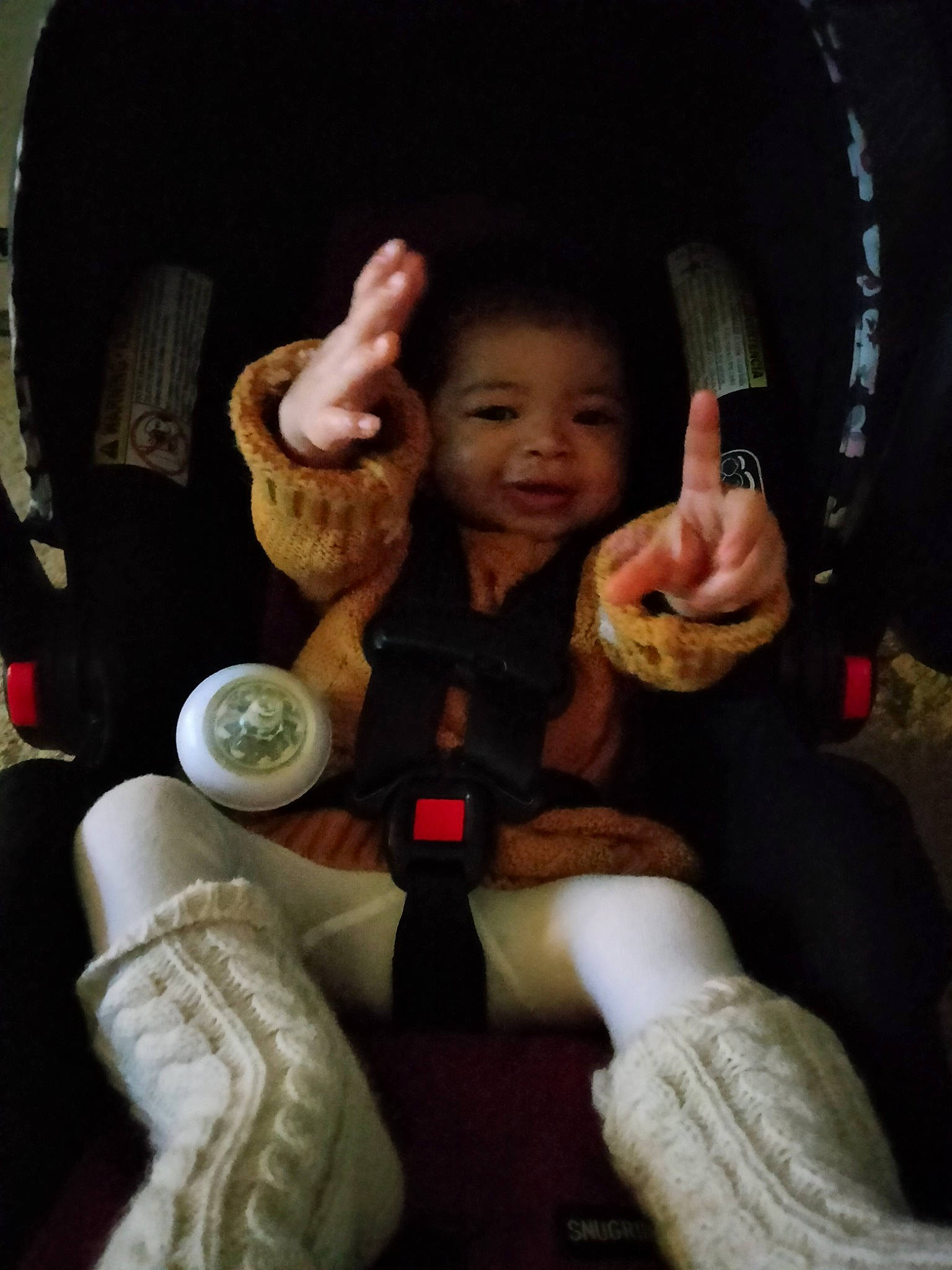 Kamiah joined the competition — help win amazing prizes! baby, car_seat, comfort, elbow, finger, fun, gesture, hand, happy, human_leg, knee, lap, nail, person, sitting, skin, smile, sock, thigh, thumb