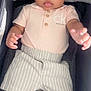 Novel is registered to the contest to win money with this photo: baby, infant, child, calvin_klein, shirt, hat, shorts, striped_shorts, sock, cushion, carrier, clothing, cute, portrait, indoors, person, reaching, resting, soft_lighting, closeup