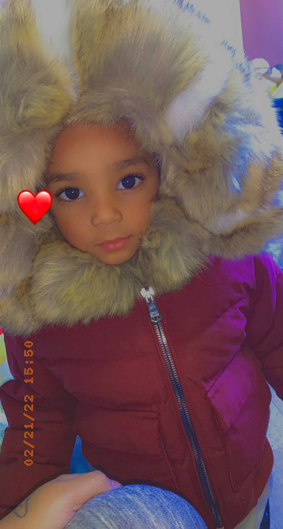 Dakari is registered to the contest to win money with this photo: cap, cheek, child, doll, eye, eyebrow, eyelash, fawn, fun, fur_clothing, head, headwear, human_body, iris, jacket, lip, nose, person, pink, skin