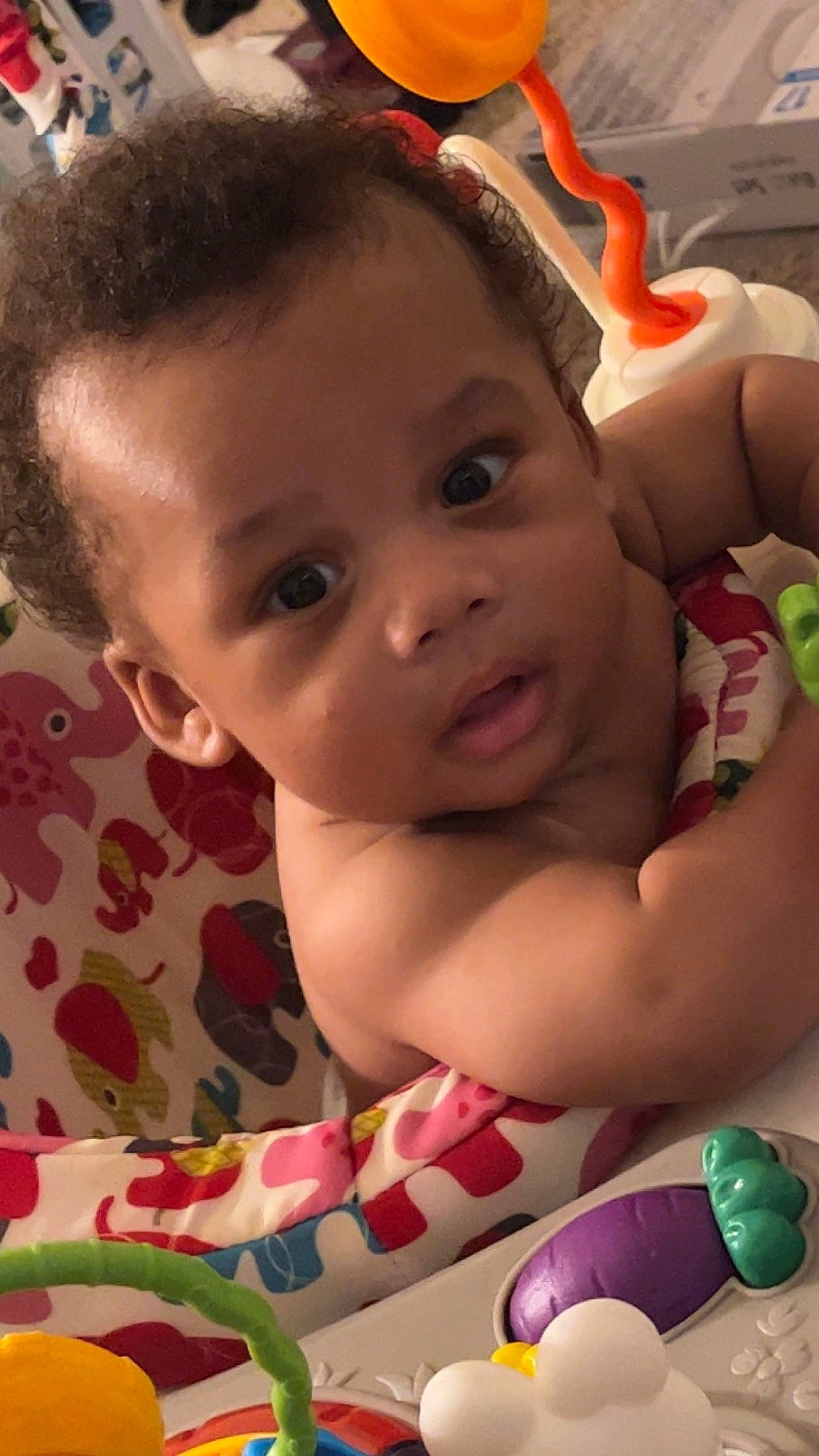 Elijah is registered to the contest to win money with this photo: baby, beauty, cheek, chin, eye, eyebrow, eyelash, facial_expression, fun, hairstyle, happy, iris, lip, mouth, nose, organ, person, pink, skin, summer