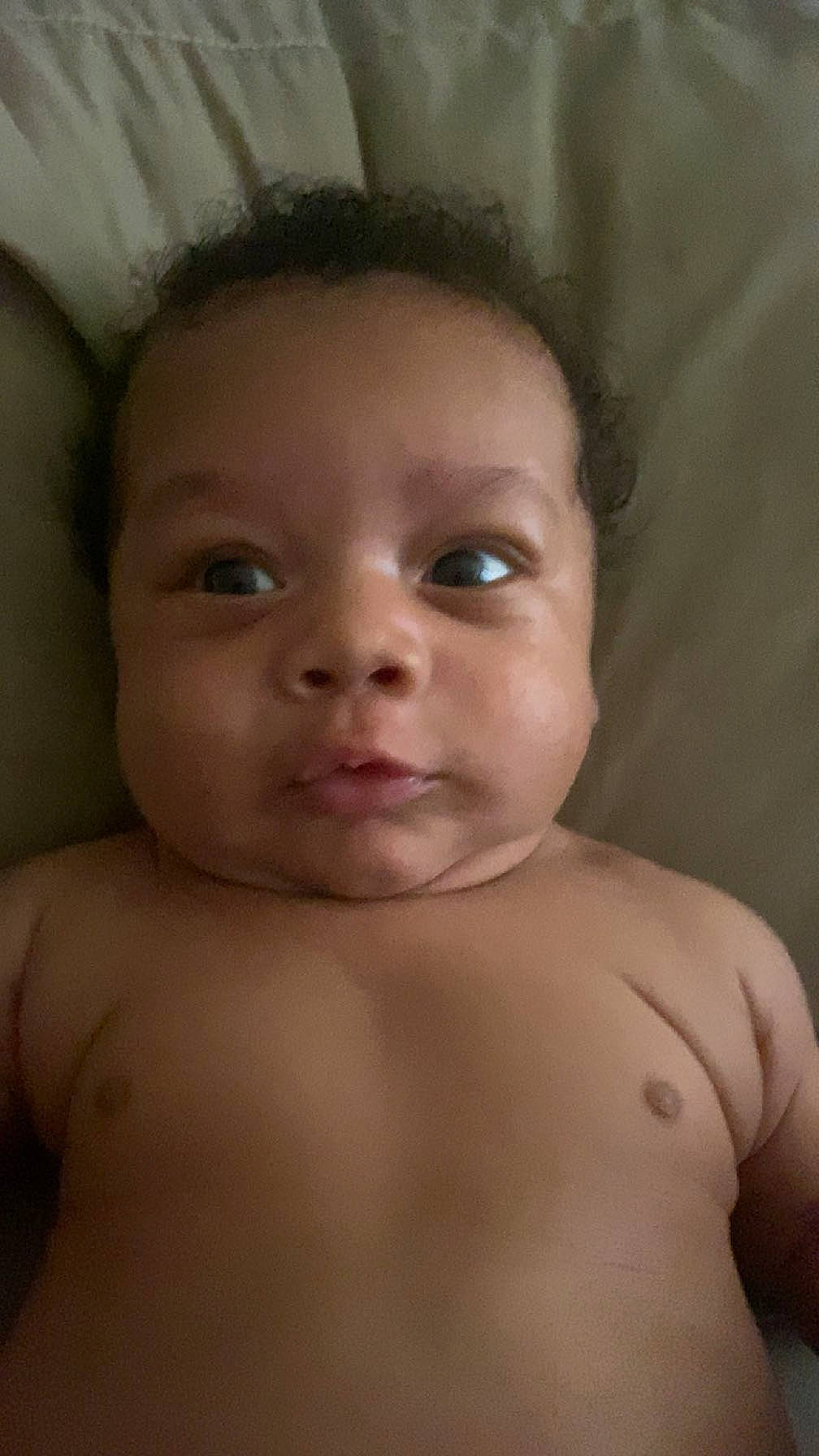 Elijah is registered to the contest to win money with this photo: arm, cheek, chin, eye, eyebrow, eyelash, face, forehead, hair, hairstyle, hand, head, human_body, iris, lip, mouth, neck, nose, person, shoulder