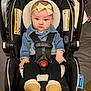baby, black_pants, blue_eyes, boots, bow, car_seat, child, clothing, cute, denim_jacket, face, headband, indoor, infant, looking_at_camera, person, safety_harness, seat, sitting, straps