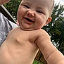 Gemma is registered to the contest to win money with this photo: arm, baby, cheerful, child, closeup, cute, daylight, diaper, expression, face, fence, grass, happy, nature, outdoor, person, portrait, skin, smiling, tree