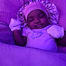 Nalani is registered to the contest to win money with this photo: baby, sleeping, blanket, mittens, bonnet, infant, cozy, purple_light, cute, peaceful, bedtime, soft, portrait, child, resting, clothing, indoor, closeup, adorable, calm