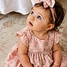 Nova joined the competition — help win amazing prizes! baby, child, infant, girl, blue_eyes, pink_dress, headband, bow, sitting, carpet, curly_hair, cute, portrait, indoors, soft_light, floral_pattern, hands, looking_up, young, adorable