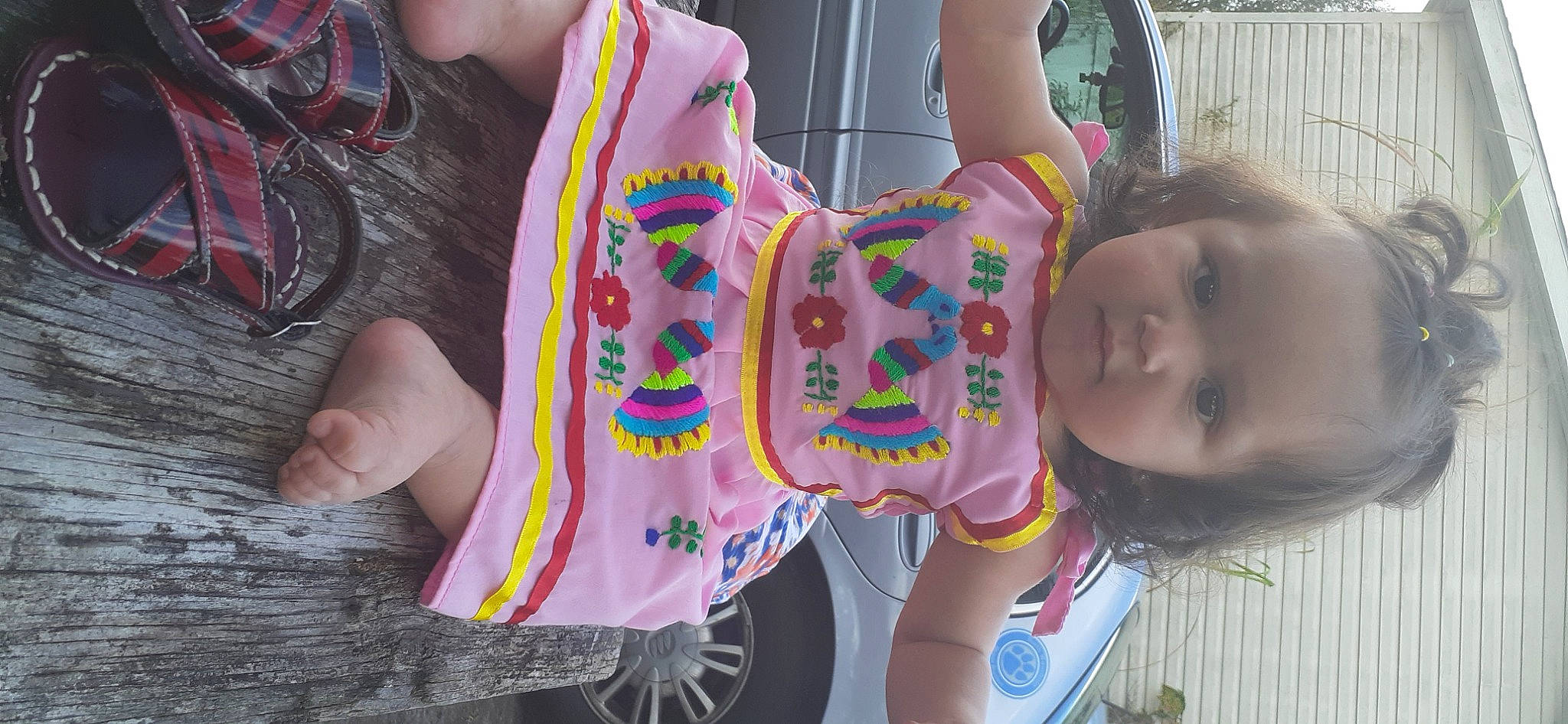 Helena is registered to the contest to win money with this photo: baby, child, event, fashion_accessory, fun, grass, happy, leisure, magenta, nail, neck, pattern, person, pink, play, recreation, skin, textile, toddler, visual_arts