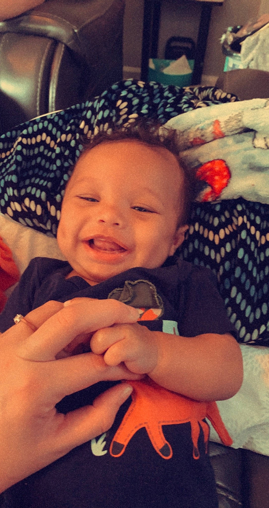 Josiah Davon is registered to the contest to win money with this photo: baby, baby_toddler_clothing, cheek, comfort, cool, finger, gesture, hand, happy, iris, lip, mouth, nose, organ, person, photograph, purple, skin, smile, snapshot