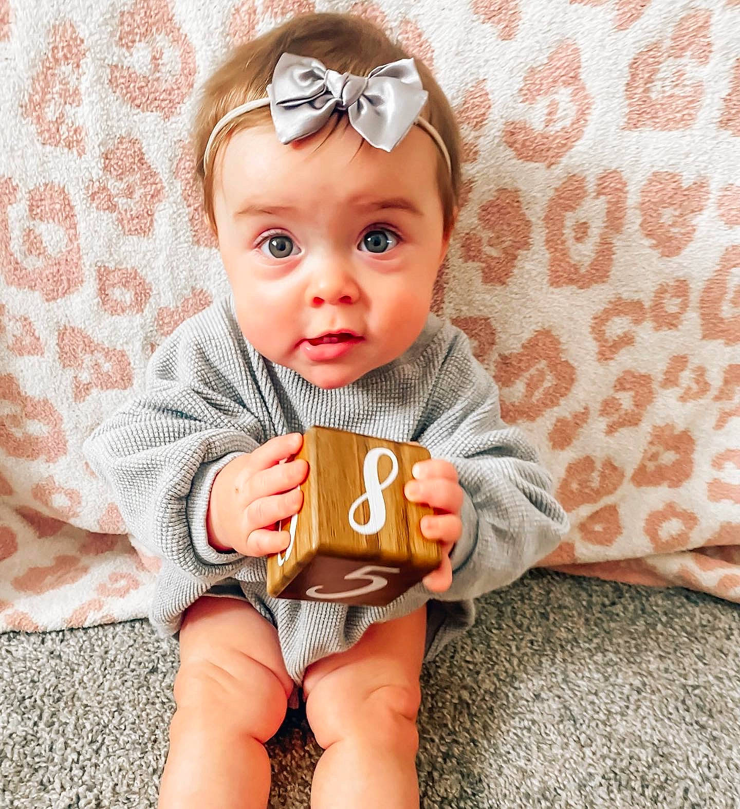 Holland is registered to the contest to win money with this photo: arm, baby, baby_toddler_clothing, cheek, chin, cool, fun, glasses, goggles, happy, head, headwear, lip, mammal, mouth, person, skin, smile, sunglasses, surprise