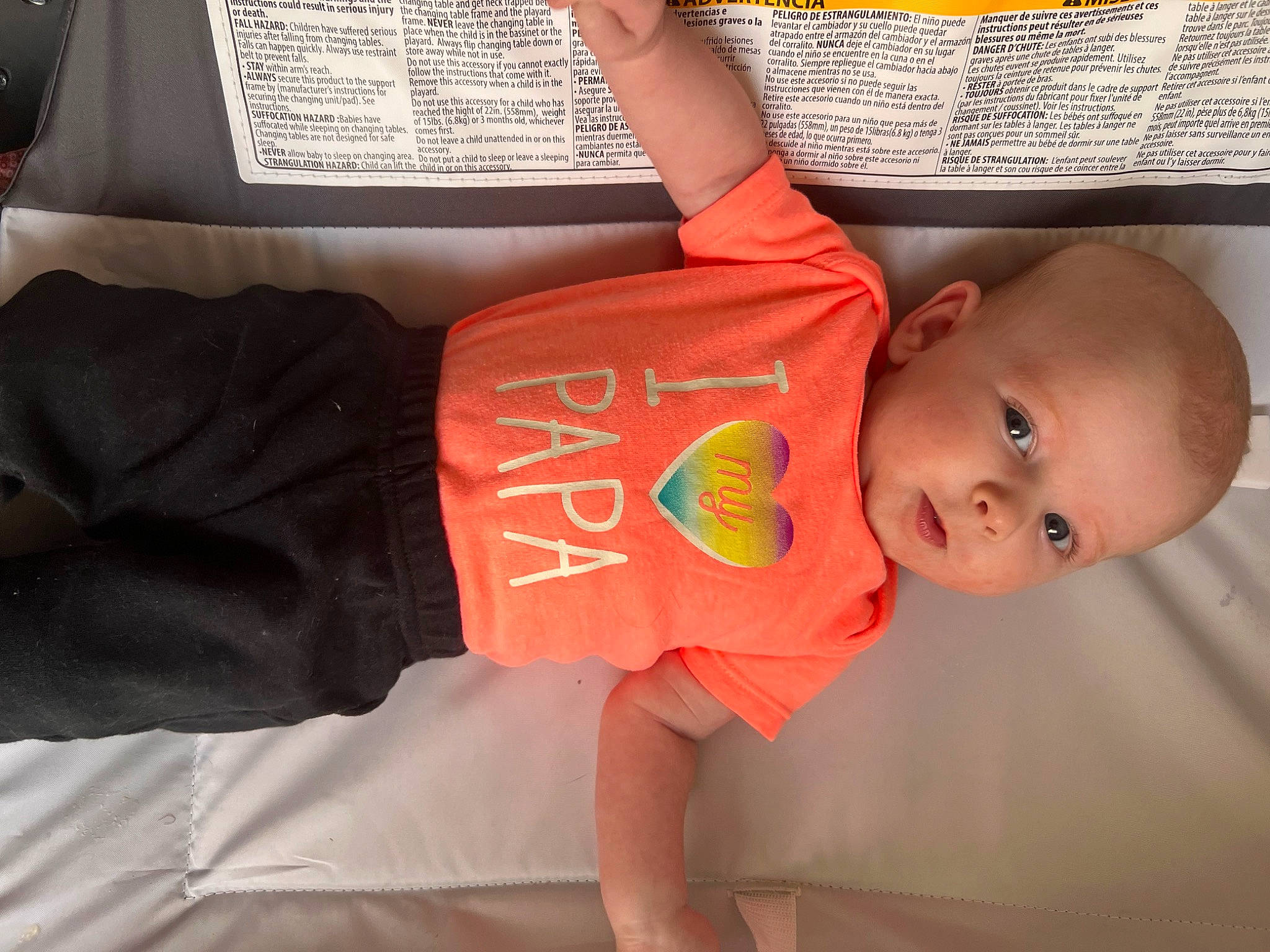 Everlee is registered to the contest to win money with this photo: baby, baby_products, baby_toddler_clothing, child, comfort, finger, fun, hand, happy, human, human_body, joint, mouth, orange, organ, people, person, room, sleeve, t_shirt