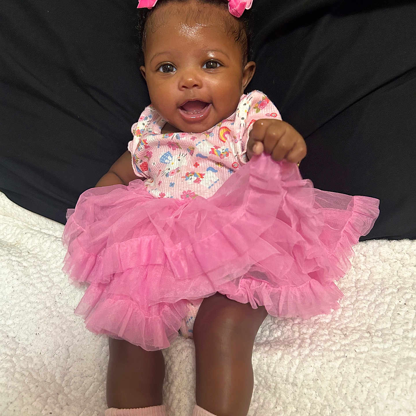 Zahria is registered to the contest to win money with this photo: baby, baby_girl, cheerful, child, clothing, cute, cute_baby, fashion, girl, happy, indoors, infant, joyful, pink_bows, pink_tutu, playful, portrait, smiling, socks, tutu