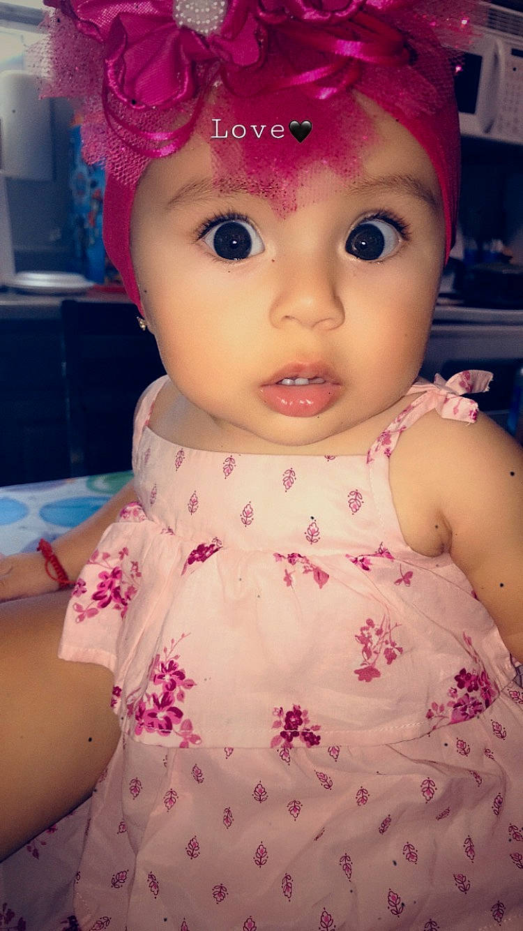 Daleyza joined the competition — help win amazing prizes! baby, cheek, child, doll, dress, eye, eyebrow, face, forehead, hair_accessory, head, headgear, headwear, iris, lip, nose, person, pink, skin, surprise