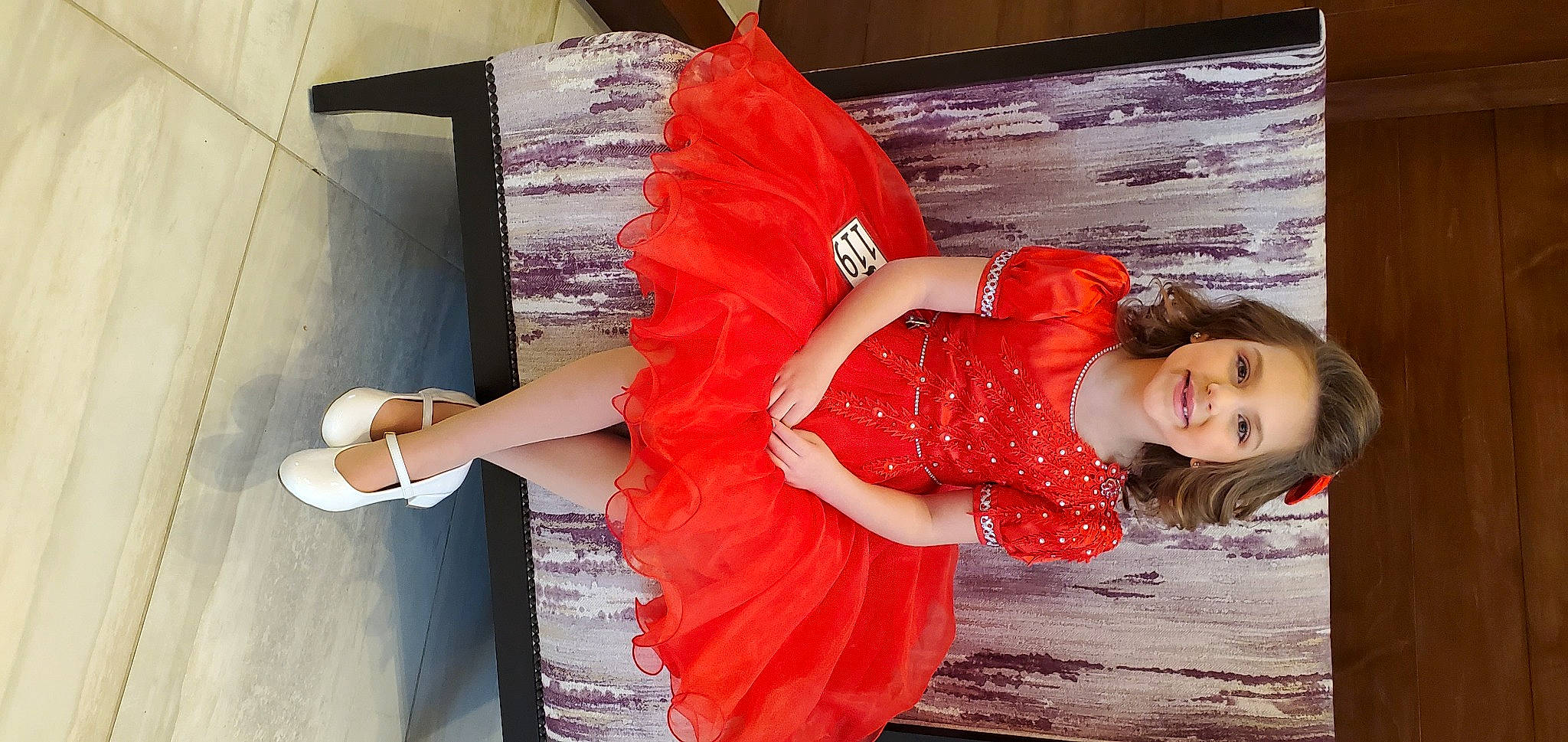 Henley is registered to the contest to win money with this photo: abdomen, baby_toddler_clothing, costume, costume_design, day_dress, embellishment, fashion_design, glove, high_heels, joy, mouth, one_piece_garment, person, sandal, shoe
