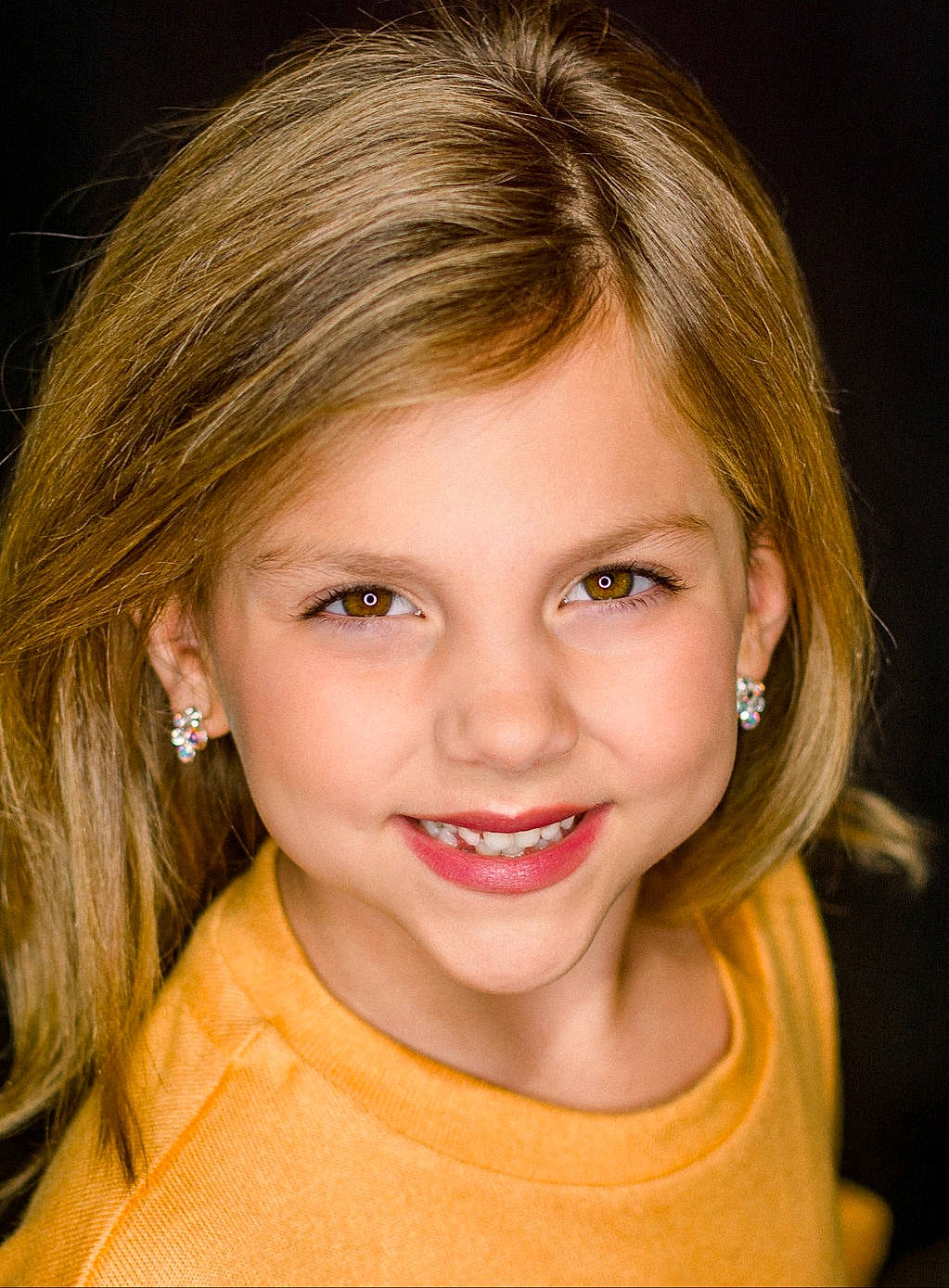 Henley is registered to the contest to win money with this photo: cheek, chin, ear, earrings, eye, eyebrow, eyelash, face, forehead, hair, hairstyle, head, iris, jaw, joy, lip, mouth, nose, organ, person