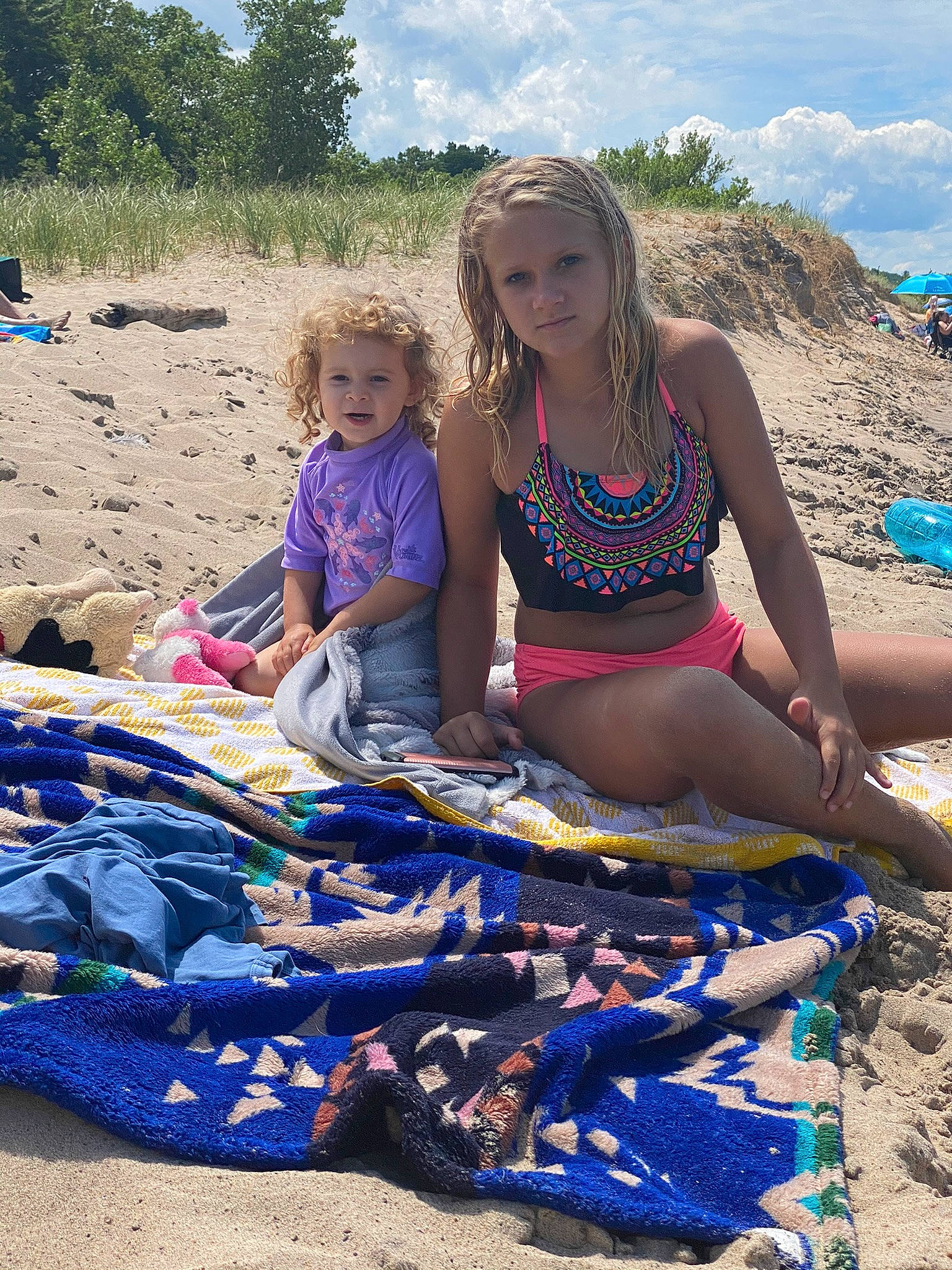 Melodie joined the competition — help win amazing prizes! beach, blue, body_of_water, brassiere, cloud, event, fun, happy, leisure, people_in_nature, people_on_beach, person, plant, recreation, sand, sky, swimwear, thigh, toddler, travel