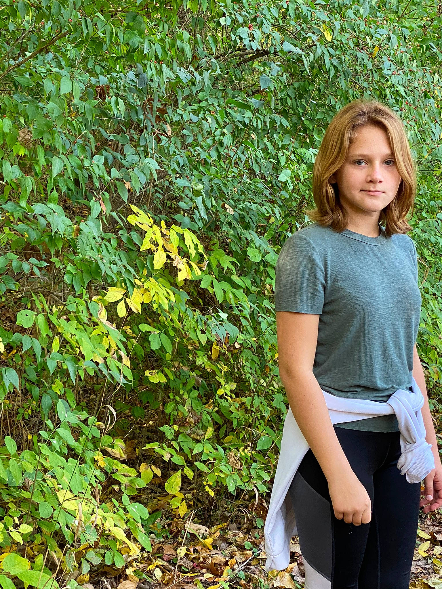 Melodie is registered to the contest to win money with this photo: brown_hair, denim, electric_blue, eyewear, fashion_design, fashion_model, flash_photography, formal_wear, grass, groundcover, human_leg, knee, long_hair, pattern, people_in_nature, person, plant, shrub, sleeve, thigh