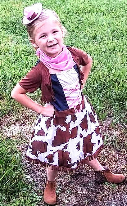 Karson Swearingen is registered to the contest to win money with this photo: baby_toddler_clothing, day_dress, dress, eye, grass, grass_family, happy, head, joy, one_piece_garment, pattern, people_in_nature, person, photograph, pink, plant, skin, sleeve, smile, summer