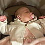 baby, sleeping, pacifier, white_cardigan, pink_dress, pearls, blanket, infant, cute, cozy, soft, cushion, child, portrait, indoors, resting, peaceful, clothing, newborn, comfort