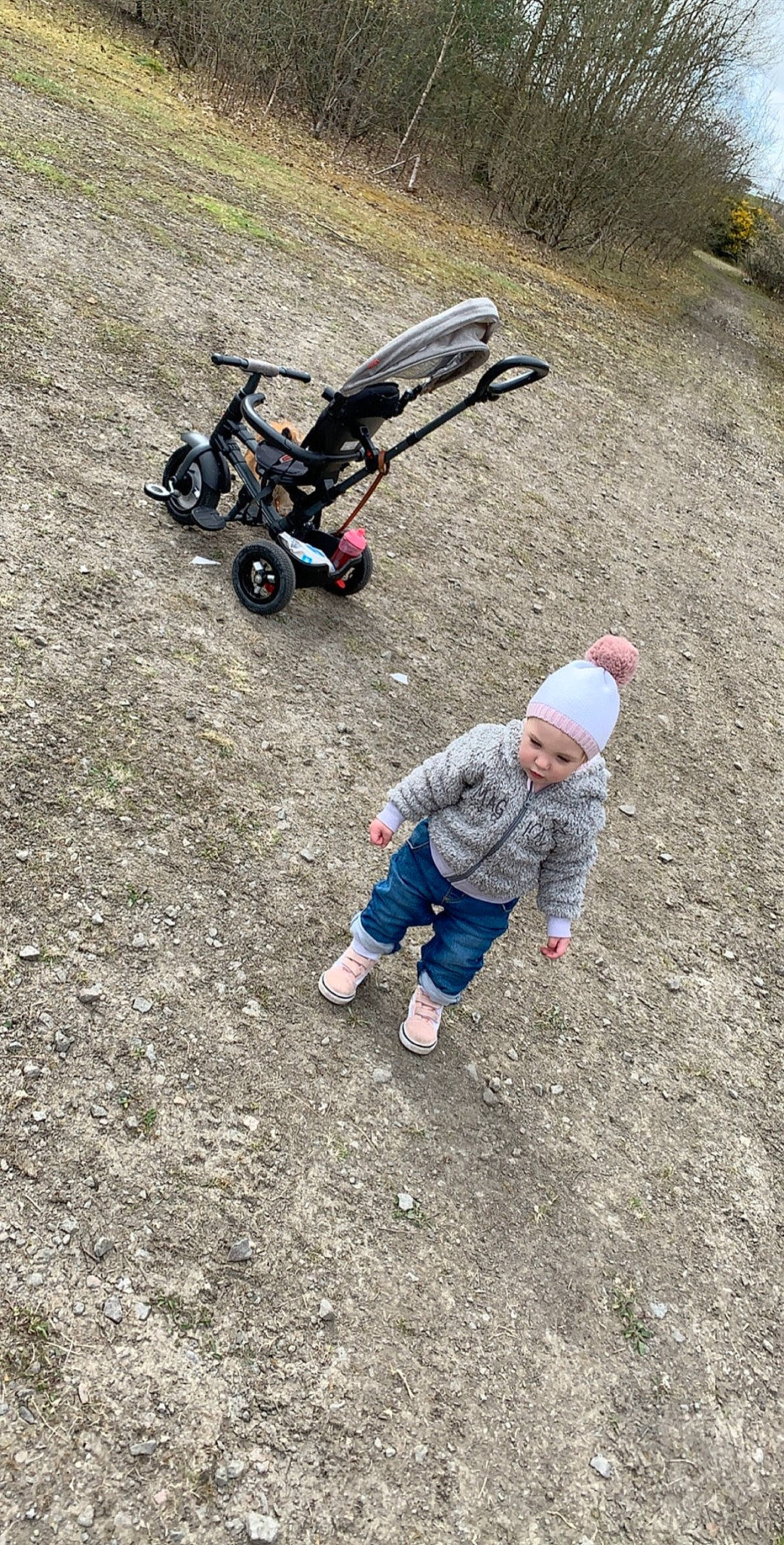 Hanna joined the competition — help win amazing prizes! asphalt, baby_carriage, grass, headwear, person, product, soil, vehicle