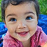 baby, child, smiling, pink_shirt, polka_dots, blue_blanket, grass, outdoor, happy, cute, portrait, close_up, face, skin, person, eyes, mouth, infant, toddler, playful