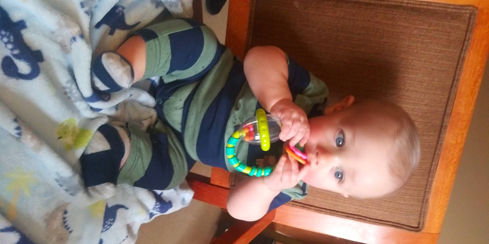 Peyton is registered to the contest to win money with this photo: baby, baby_products, baby_toddler_clothing, baby_toys, cheek, child, comfort, finger, flooring, fun, happy, mouth, nail, nose, person, play, room, stuffed_toy, toddler, toy