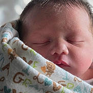 Colton joined the competition — help win amazing prizes! baby, blanket, child, close_up, cozy, cute, face, head, indoors, infant, newborn, peaceful, portrait, rest, skin, sleeping, soft, teddy_bear, wrapped, young